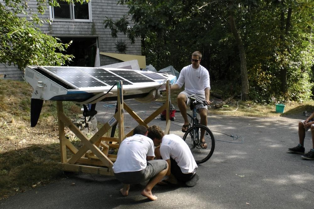 Scout team members prepare the robotic boat for its voyage. (Dave Schneider/IEEE Spectrum)