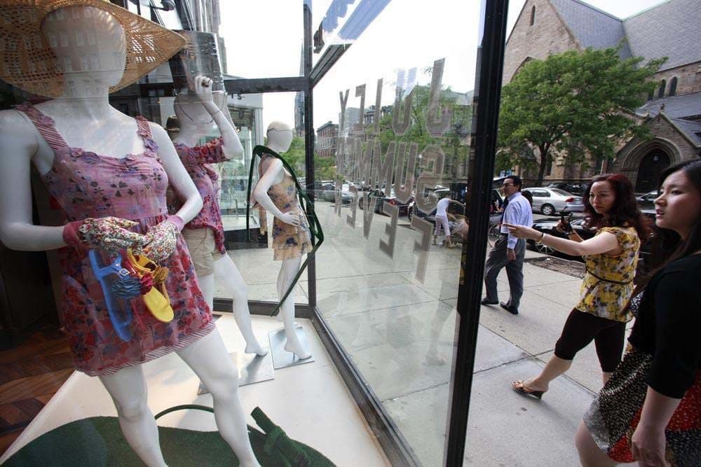 The Women’s Lunch Place is a daytime shelter housed in a church basement on Newbury Street — typically known for high-end retail shops like the one pictured here. That it even exists here shows what a study in contrasts the Back Bay is. (Steven Senne/AP)