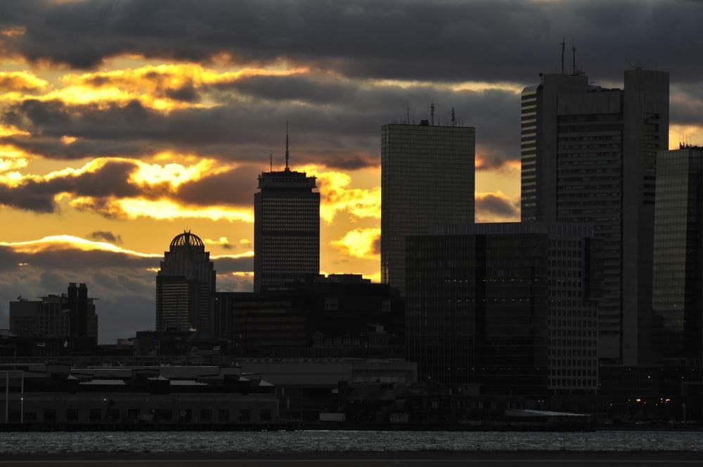 Part of the Boston skyline at sunset . (AP)