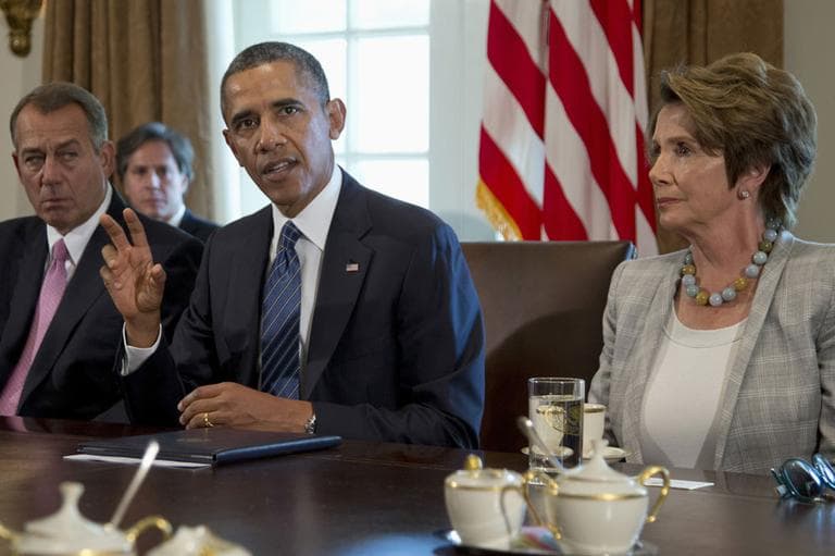 President Barack Obama, flanked by House Speaker John Boehner of Ohio, left, and House Minority Leader Nancy Pelosi of Calif., speaks to media in the Cabinet Room of the White House in Washington, Tuesday, Sept. 3, 2013, before a meeting with members of Congress to discuss the situation in Syria. (AP Photo/Carolyn Kaster)