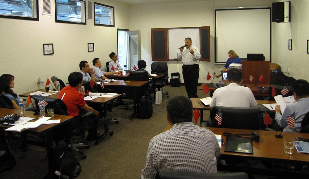 A class of Chinese students at the Auction Systems Auctioneers and Appraisers in Phoenix. (Steve Shadley/KJZZ)
