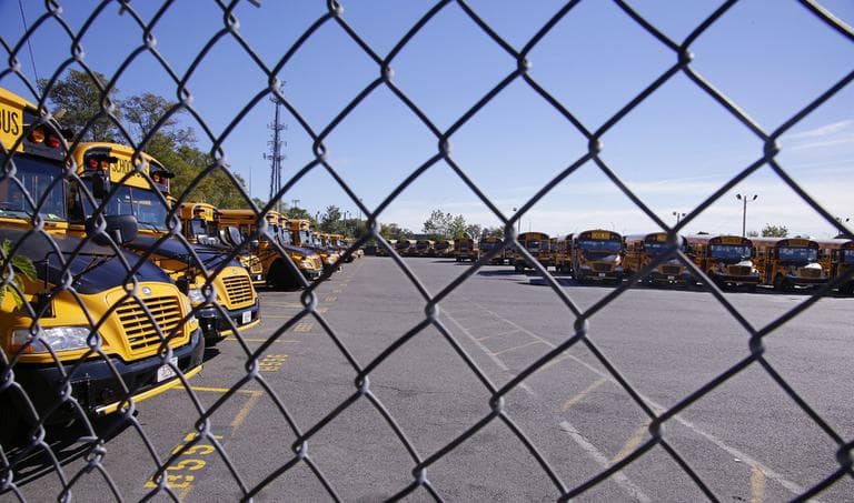 School officials said about 600 of 700 unionized drivers unexpectedly went on strike , leaving just 30 of 650 bus routes staffed. Pictured here, Boston school buses sit idle Tuesday morning at Veolia Transportation, the city's school bus contractor. (Stephan Savoia/AP)