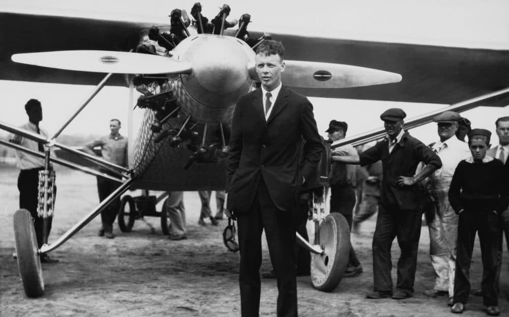 Aviator Charles A. Lindbergh stands in front of his plane "The Spirit of St. Louis" in New York in before his historic solo flight to Paris, May 20, 1927. (AP)