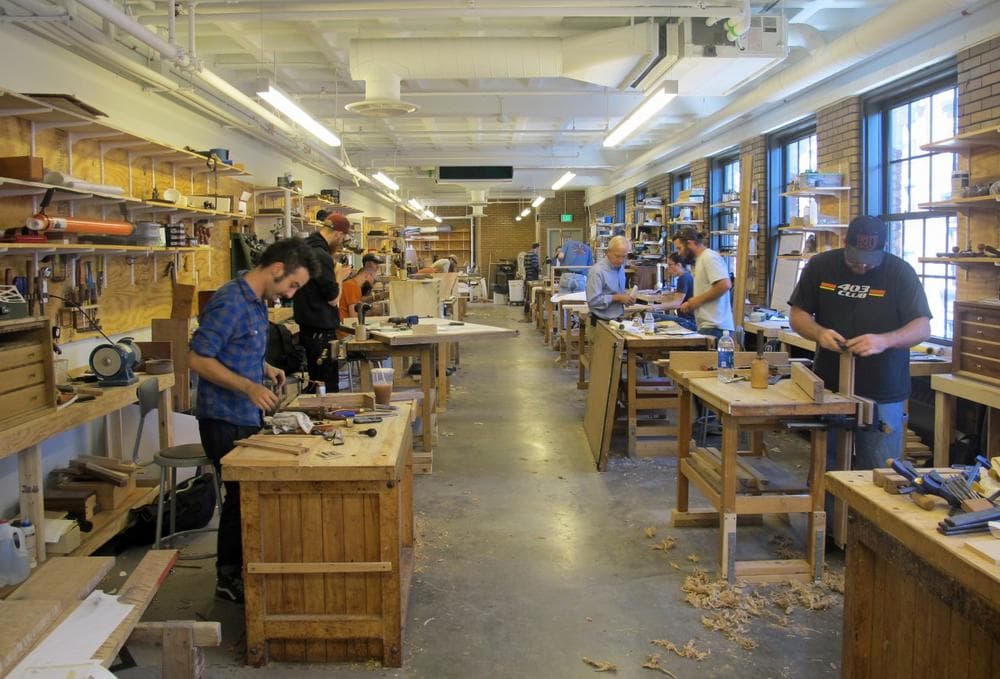 A workshop full of students at the North Bennet Street School in Boston’s South End. (Andrea Shea/WBUR)
