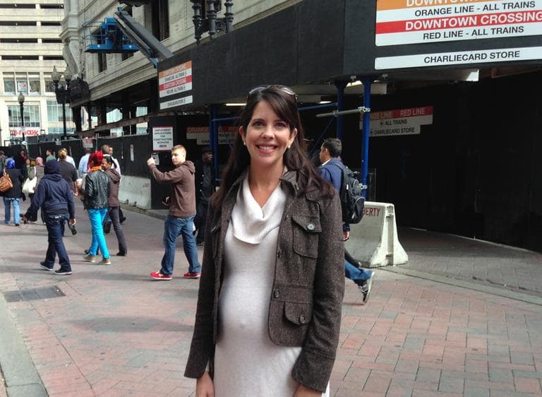 Downtown Crossing resident Julie Ogden is conflicted over her desire to help the homeless and her support for high-end housing she thinks will revitalize the neighborhood. (Lynn Jolicoeur/WBUR)