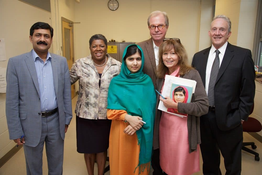 From left: Ziauddin Yousafzai, Jackie Jenkins- Scott, President of Wheelock College, Malala Yousafzai,
Nicholas Negroponte, founder of “One Laptop per Child” Association, Robin Young, host of Here & Now, and Tom McNaught, executive director of the John F. Kennedy Library Foundation. (Tom Fitzsimmons)