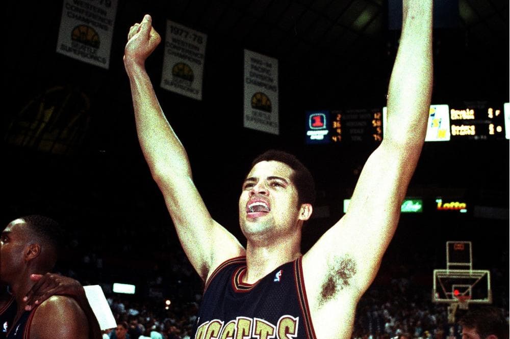 Bison Dele celebrates a win for the Denver Nuggets. (Bill Chan/AP)