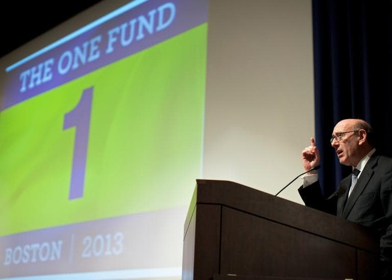 Boston advertising agency Hill Holliday created The One Fund logo, seen here with fund administrator Kenneth Feinberg on May 6, in just 15 minutes. (Yoon S. Byun/The Boston Globe/AP, Pool)