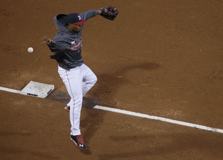 Xander Bogaerts reaches for a ball during a workout at Fenway on Tuesday.  At 21, the Boston third baseman from Aruba has blossomed into one of the game’s top fresh talents. (Charles Krupa/AP)