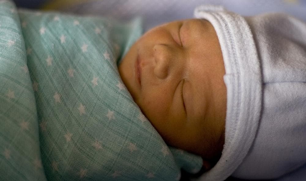 Swaddled Baby (Geoffrey Wiseman/Flickr)