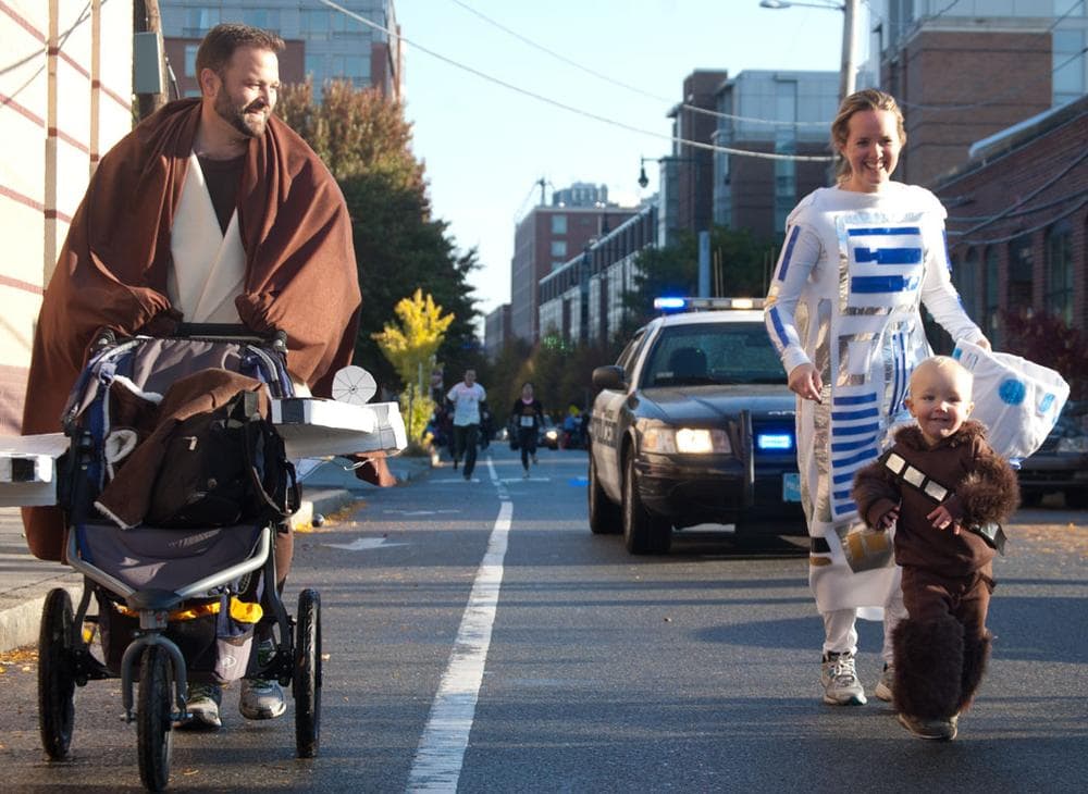 Obi-Wan (?), R2-D2 and  Chewbacca with a stroller Millennium Falcon on Sidney Street. (Greg Cook)