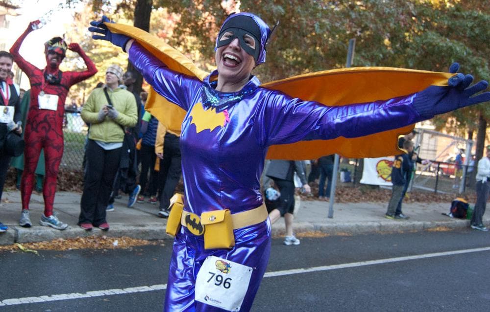 A 1960s-television-style Batgirl approaches the finish. (Greg Cook) 