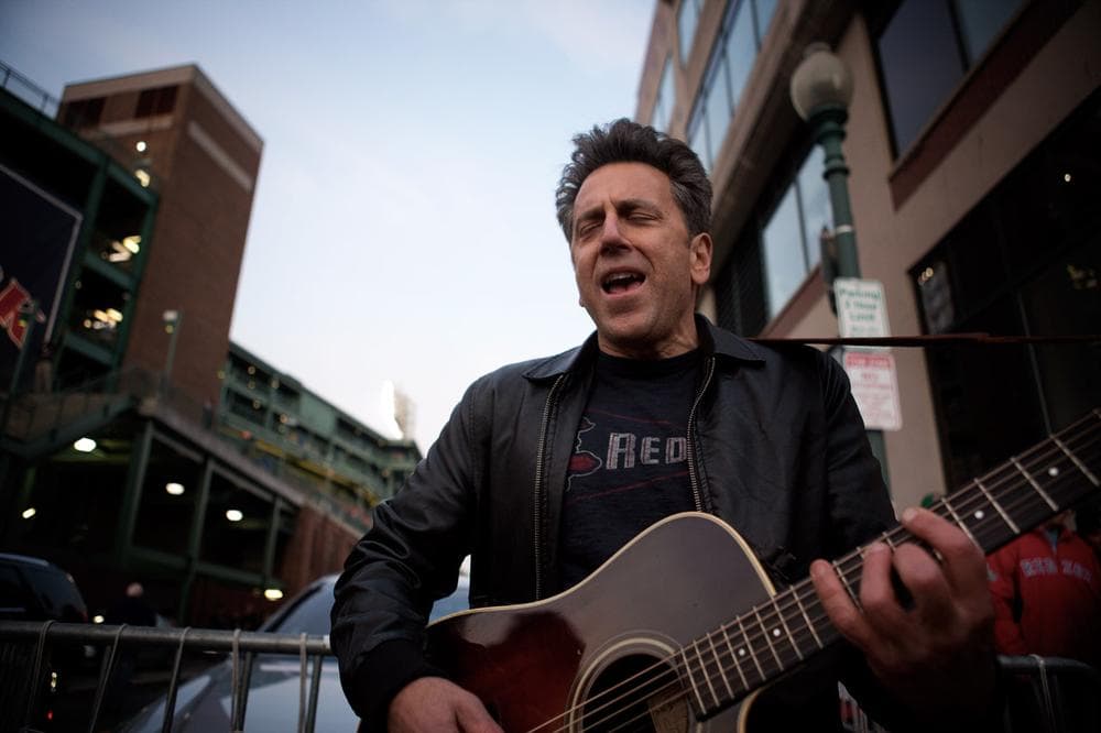 Jerry Velona sings “ Koji’s On The Mound” to the tune of "Sea Cruise" on Van Ness Street. (Jesse Costa/WBUR)
