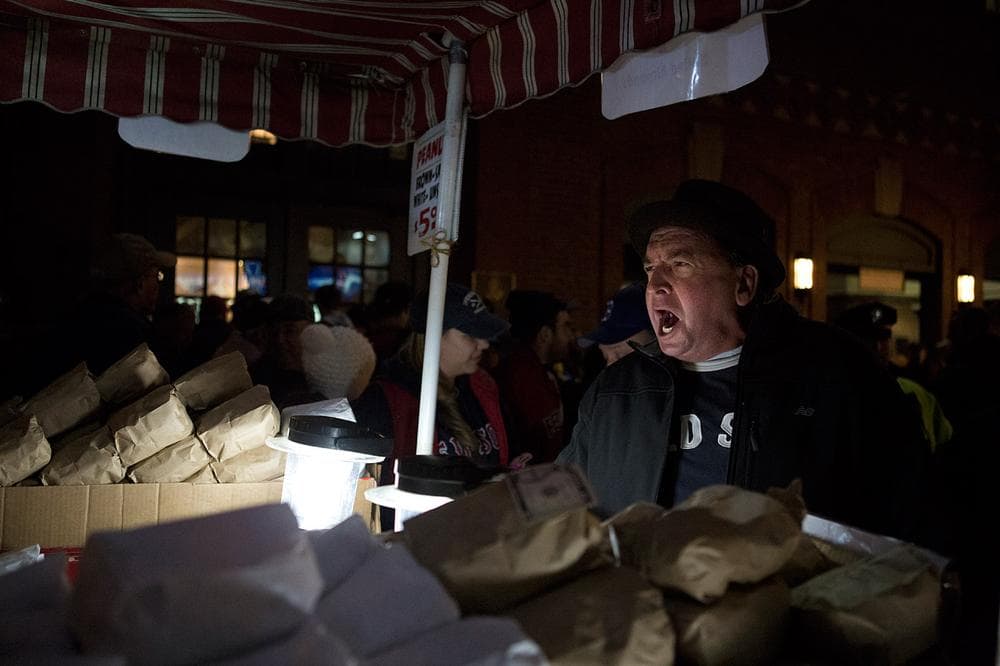 A peanut vendor sells snacks on Yawkey Way. (Jesse Costa/WBUR)