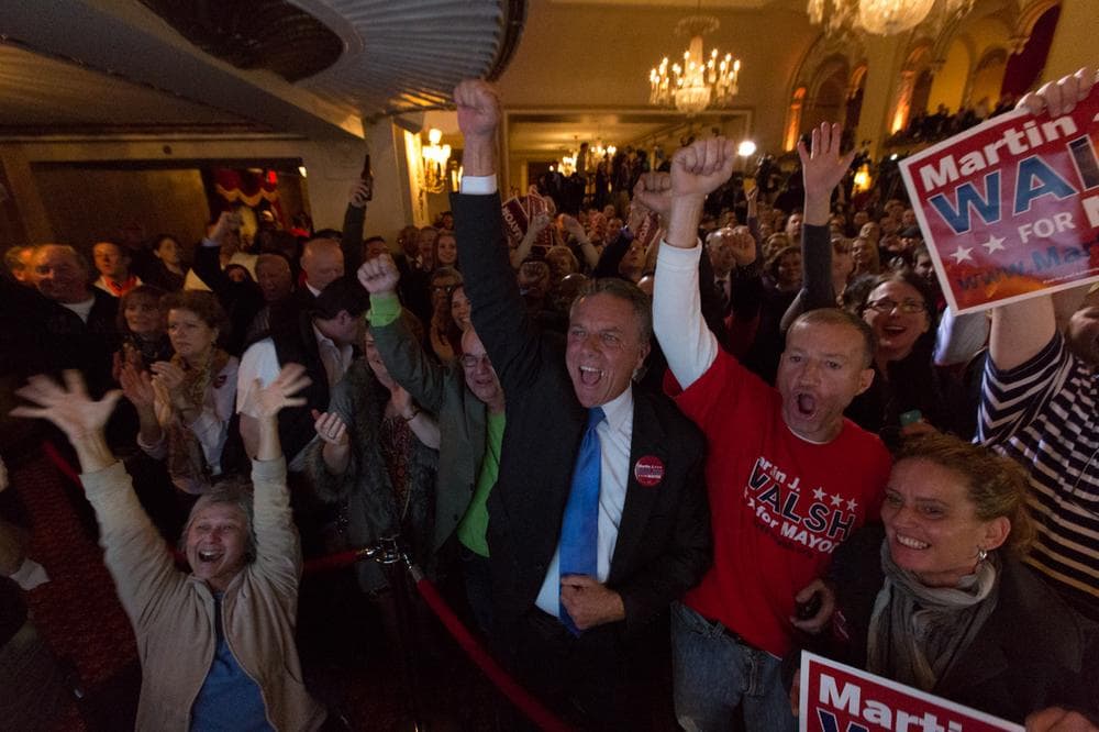 Supporters of state Rep. Marty Walsh celebrate as City Councilor John Connolly concedes in the Boston mayoral race. (Joe Spurr/WBUR)