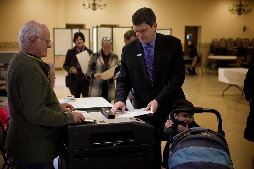 Mayoral candidate John Connolly casts his ballot in West Roxbury. (Jesse Costa/WBUR)