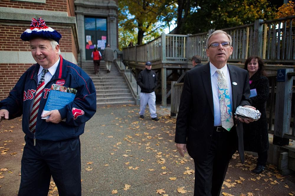 Bill Walczak, who ran in the mayoral preliminary, and Roger Croke, both from Savin Hill, after casting their ballots at the Cristo Rey High School. (Jesse Costa/WBUR)