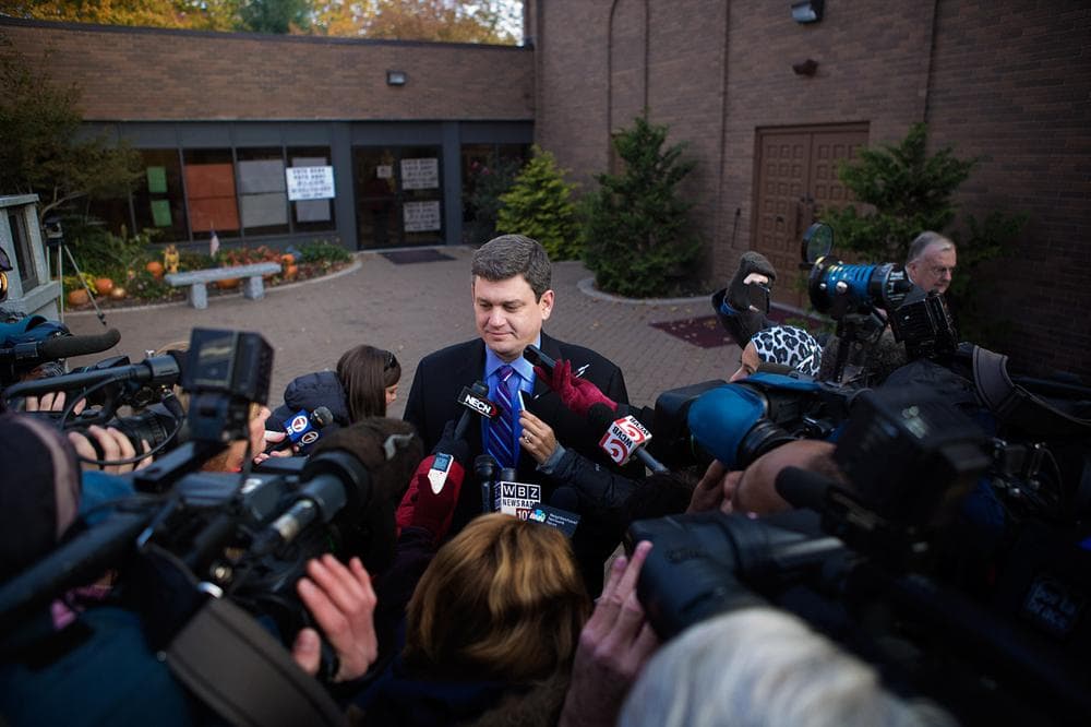 John Connolly speaks with the press after voting. (Jesse Costa/WBUR)
