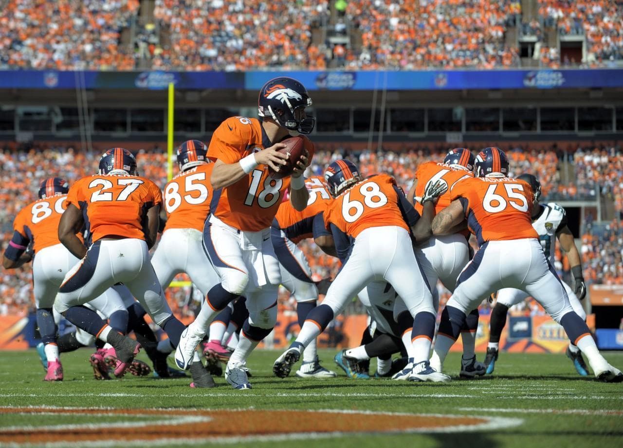 Will Peyton Manning persevere past his sprained ankle and the undefeated Kansas City Chiefs? (Jack Dempsey/AP)