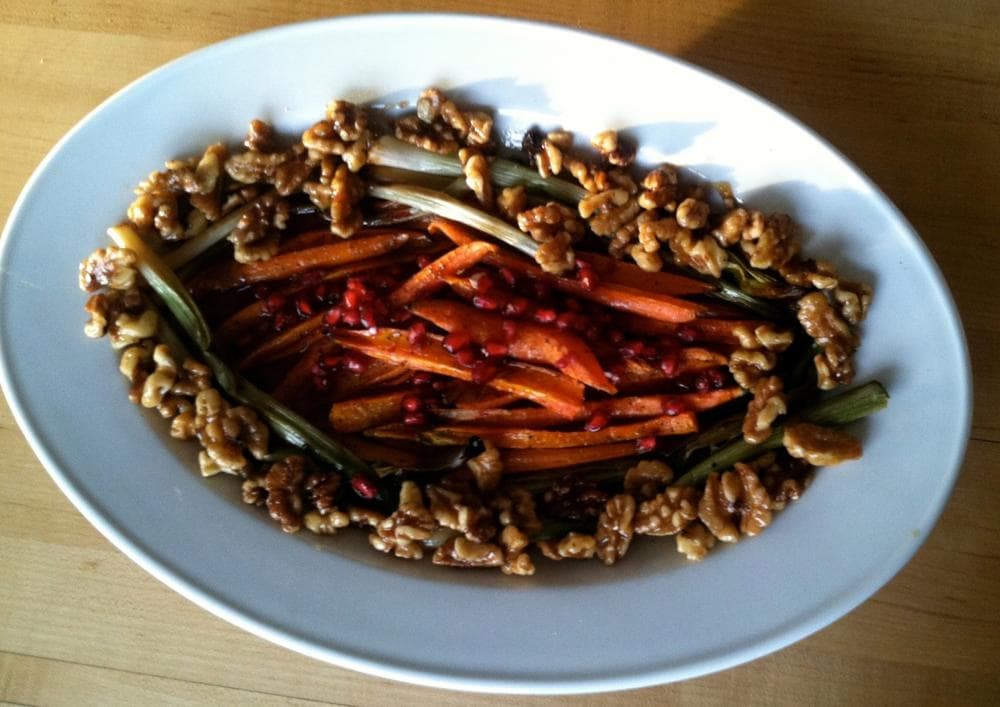 Kathy Gunst's "Roasted Maple-Glazed Carrots with Pomegranates, Char-Roasted Scallions, and Maple Glazed Walnuts." (Kathy Gunst/Here &amp; Now)