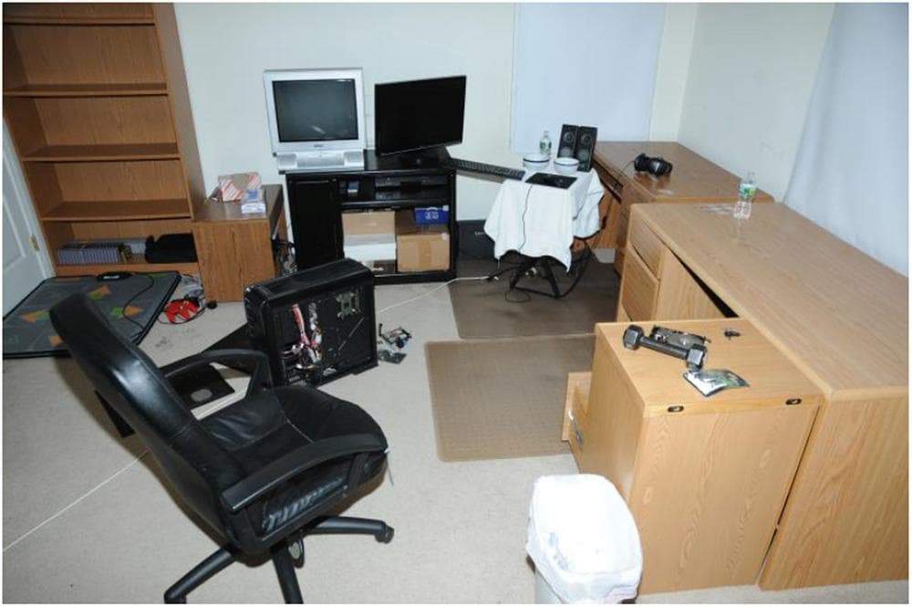 This image contained in the "Appendix to Report on the Shootings at Sandy Hook Elementary School and 36 Yogananda St., Newtown, Connecticut On December 14, 2012" and released Monday, Nov. 25, 2013, by the Danbury, Conn., State’s Attorney shows a scene at 36 Yogananda St., where gunman Adam Lanza lived with his mother in Newtown, Conn. Lanza opened fire inside the school killing 20 first-graders and six educators before killing himself as police arrived. (AP Photo/Office of the Connecticut State's Attorney Judicial District of Danbury)