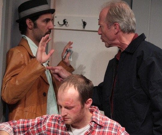 Alex Pollock (foreground), Nael Nercer and Will Lyman in "Windowmen." (Courtesy, Boston Playwright's Theatre)