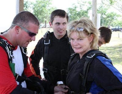Shirley Dygert is strapped in for the jump by David Hartsock. (Courtesy)
