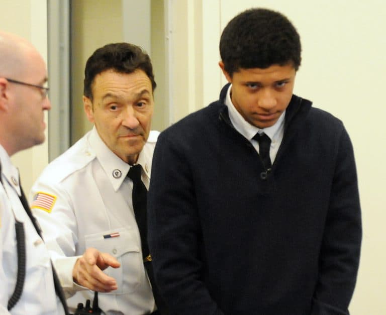 Danvers' Phillip Chism, 14, is led into his arraignment on murder charges in Salem Superior Court Wednesday. (Paul Bilodeau/The Eagle-Tribune/AP, Pool)