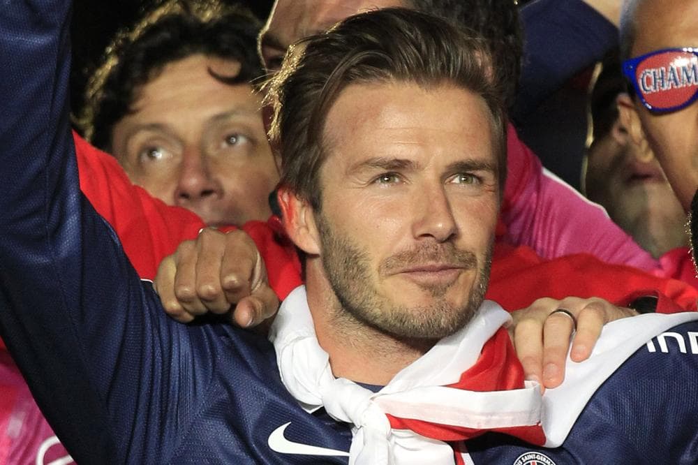 With his playing days behind him, David Beckham is hoping to continue his winning streak with LeBron James. (Thibault Camus/AP)