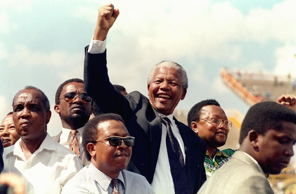 South African National Congress President Nelson Mandela arrives for his first election rally, March 15, 1994, for the April 27 general elections. (Walter Dhladhla/AFP/Getty Images)