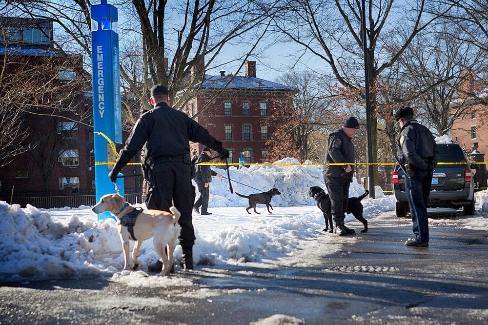 Police officers patrol Harvard University Monday after bomb threats were made. (Jesse Costa/WBUR)