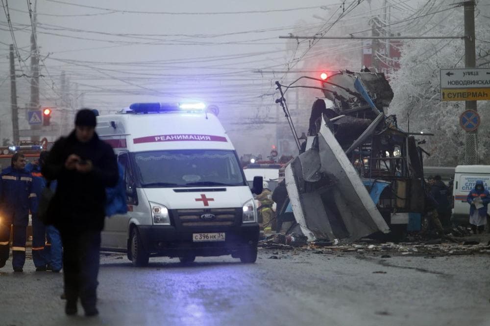 An ambulance leaves the site of a trolleybus explosion in Volgograd, Russia, Monday, Dec. 30, 2013. The explosion left 10 people dead Monday, a day after a suicide bombing that killed at least 17 at the city's main railway. The explosions put the city on edge and highlighted the terrorist threat that Russia is facing as it prepares to host the Winter Games in February. Volgograd is about 650 kilometers (400 miles) northeast of Sochi, where the Olympics are to be held. (Denis Tyrin/AP)