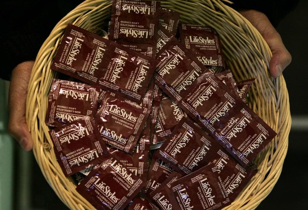 A basket of condoms is displayed.. (AP)