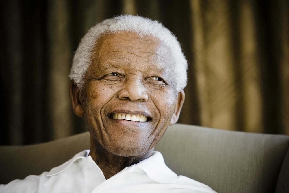 Former South African President Nelson Mandela reacts at the Mandela foundation, in Johannesburg, South Africa, Tuesday June 2, 2009, during a meeting with a group of American and South African students as part of a series of activities leading to Mandela Day on July 18th. The anti-apartheid leader died in his home on Dec. 5, 2013.