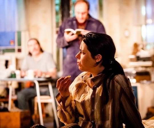 Caoilfhionn Dunne (foreground) with Ciarán Hinds and Michael McElhatton in Conor McPherson's "The Night Alive" at the Atlantic Theater Company. (Helen Warner)