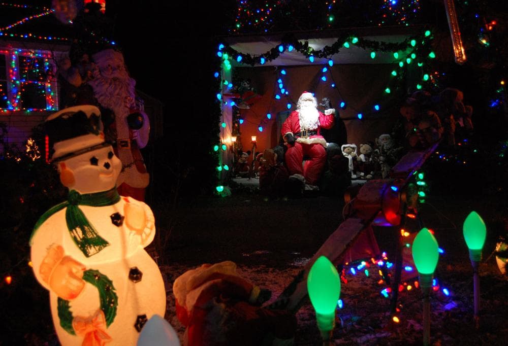 Santa waves on Washington Street in Melrose. (Greg Cook)