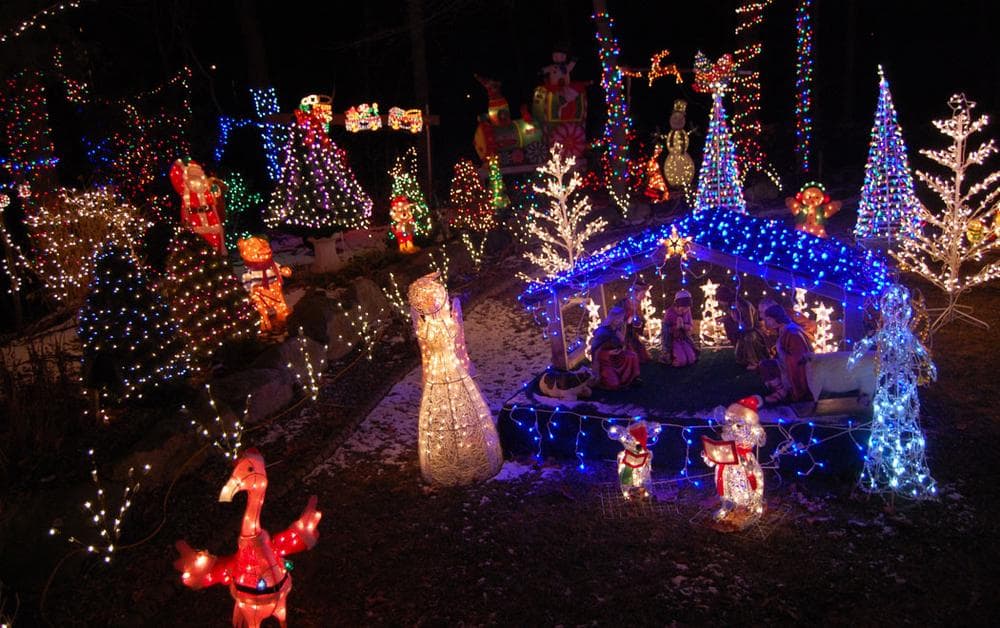 Manger scene with flamingos at Santa's sleigh at 16 Lynn Fells Parkway, Saugus. (Greg Cook)