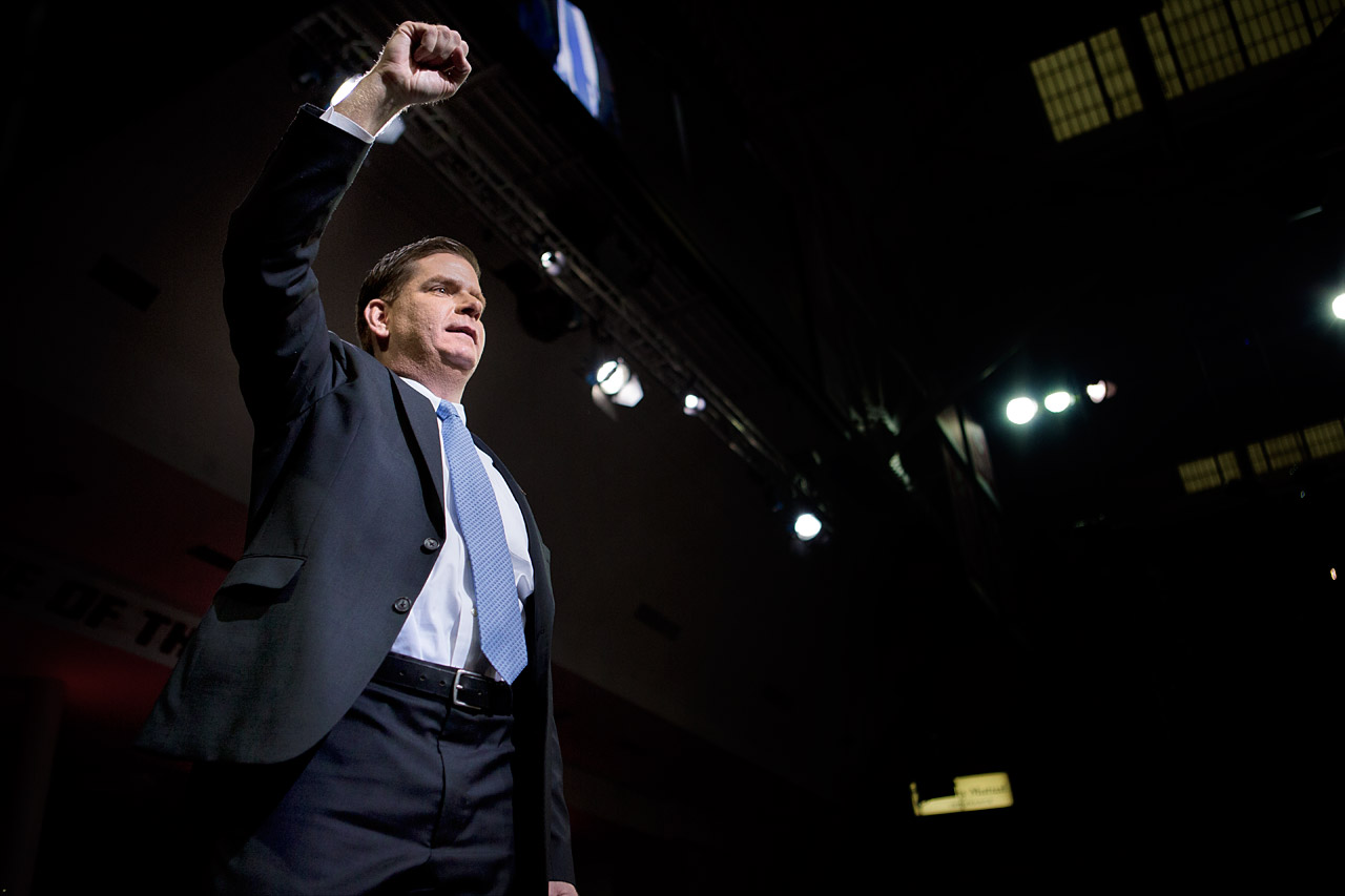 New Boston Mayor Martin Walsh salutes the crowd at his inauguration Monday at Boston College. (Jesse Costa/WBUR)