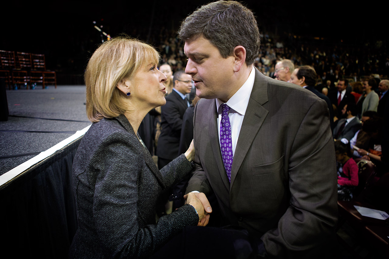 Attorney General Martha Coakley and former City Councilor (and mayoral candidate) John Connolly shake hands. (Jesse Costa/WBUR)