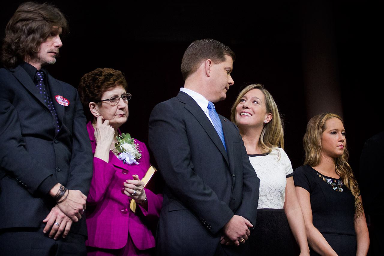 Walsh and his longtime girlfriend, Lorrie Higgins, share a smile after being sworn in. (Jesse Costa/WBUR)