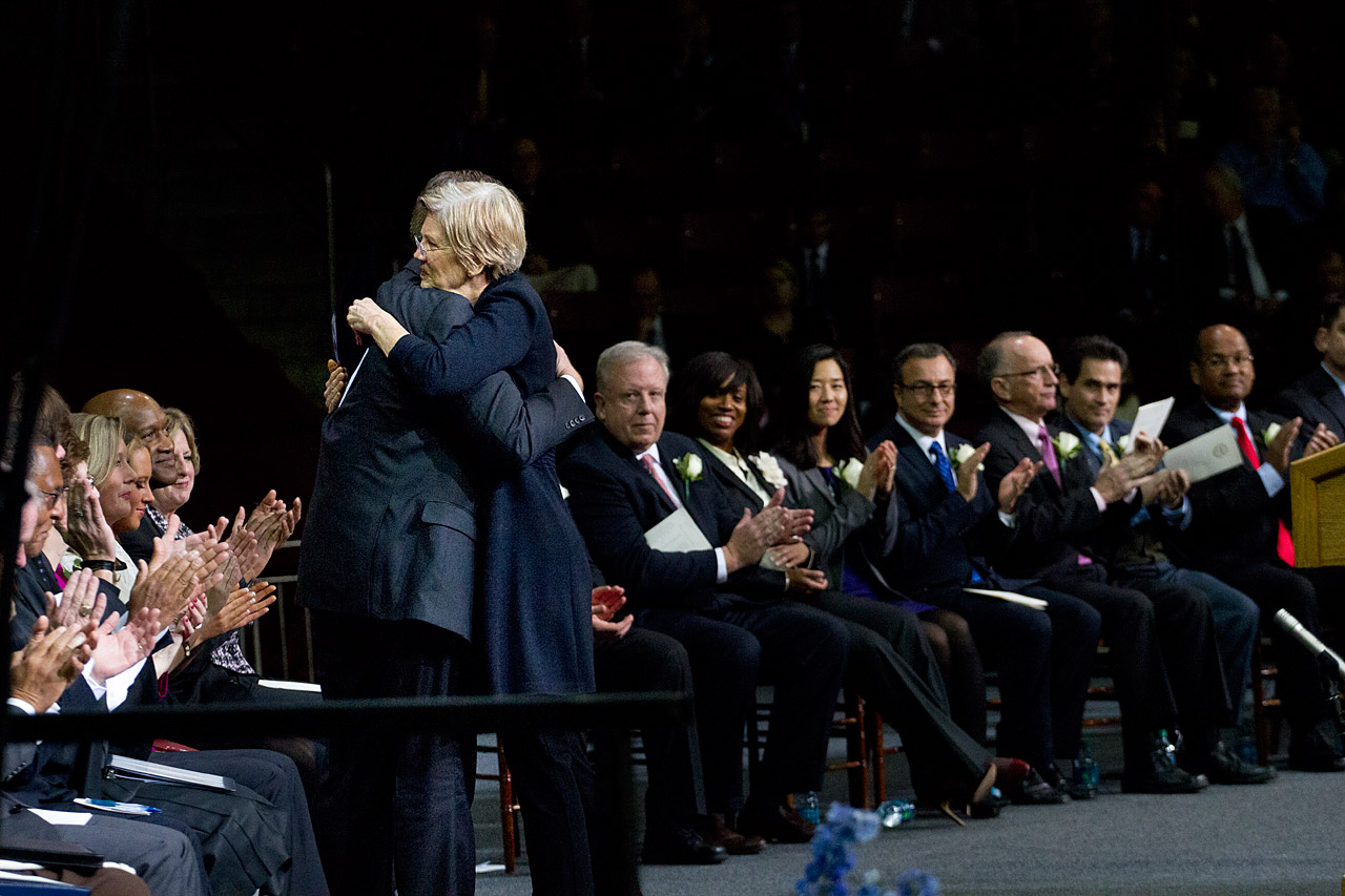 U.S. Sen. Elizabeth Warren hugs Walsh after her remarks. (Jesse Costa/WBUR)