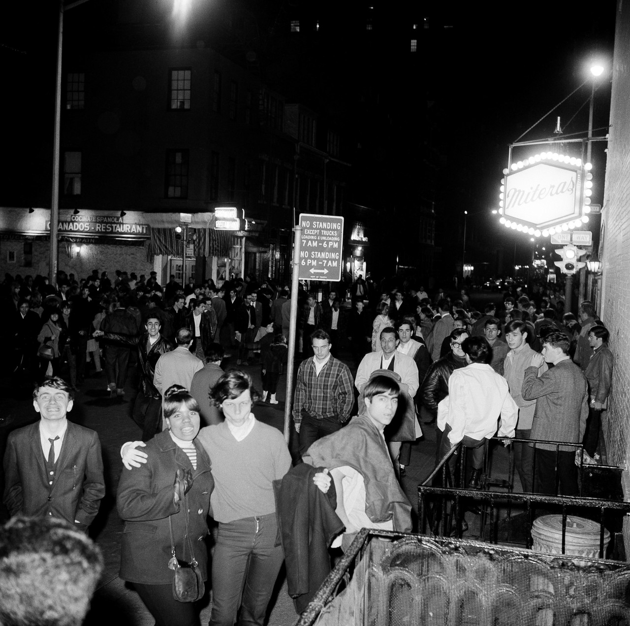 Beatniks, hippies and young people in general mill about MacDougal Street during a protest in New York's Greenwich Village, March 18, 1966. (John Lent/AP)