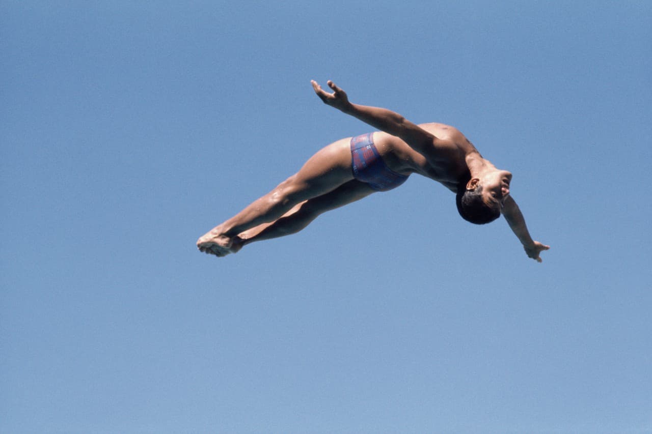 Louganis is widely considered to be the greatest diver in the history of the sport. (Tony Duffy/Getty Images)