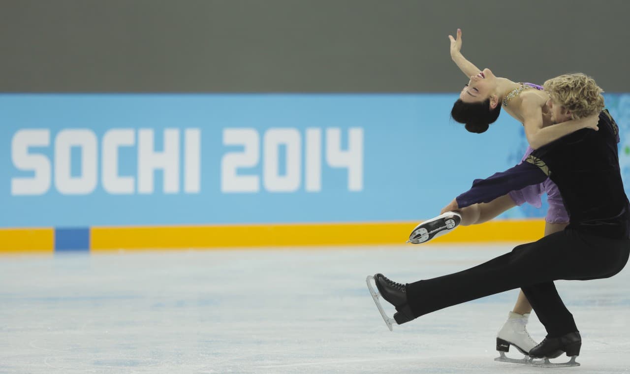 Meryl Davis and Charlie White of the U.S. skate at the figure skating practice rink ahead of the 2014 Winter Olympics, Wednesday, Feb. 5, 2014, in Sochi, Russia. (Ivan Sekretarev/AP)