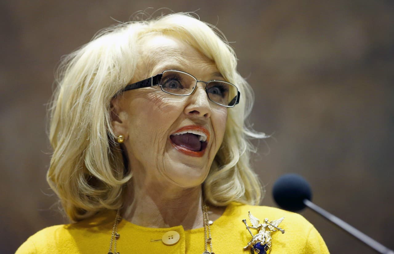 Arizona Gov. Jan Brewer has been urged to veto a bill that would allow business owners to refuse service to gays or other groups that offend their religious beliefs. (Ross D. Franklin/AP)