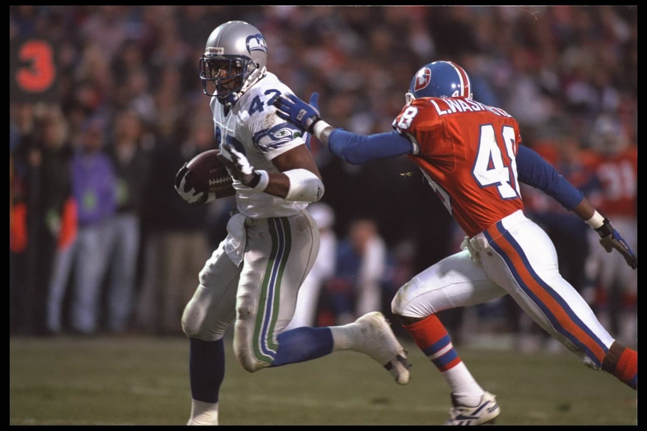 In 1995, Seattle running back Chris Warren scored the game-winning touchdown in the Seahawks 31-27 victory in Denver. (Al Bello/Getty) 