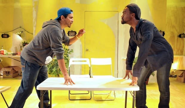 Jaime Carrillo, as Jackie, faces off against Maurice Emmanuel Parent, as Ralph, in SpeakEasy Stage Company’s production of “The Motherf**ker With the Hat.” (Craig Bailey/Perspective Photo)