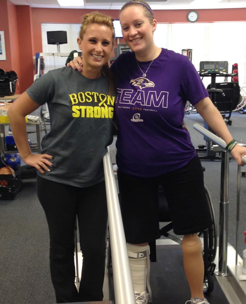 Brannock, right, and friend Bre Dickerson during a physical therapy session (Courtesy Carol Downing)