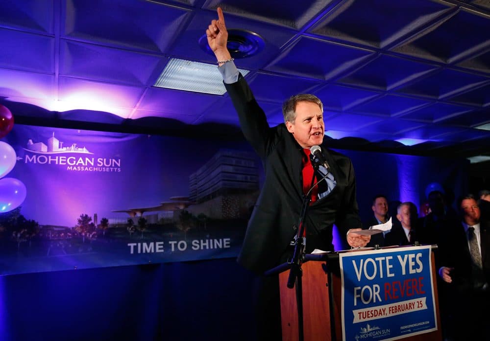 On Feb. 25, Mohegan Sun CEO Mitchell Etess celebrates the passage of a referendum allowing the casino operator to move forward with its plan at Suffolk Downs in Revere. A new WBUR poll finds declining support for casinos in the state. (Elise Amendola/AP)
