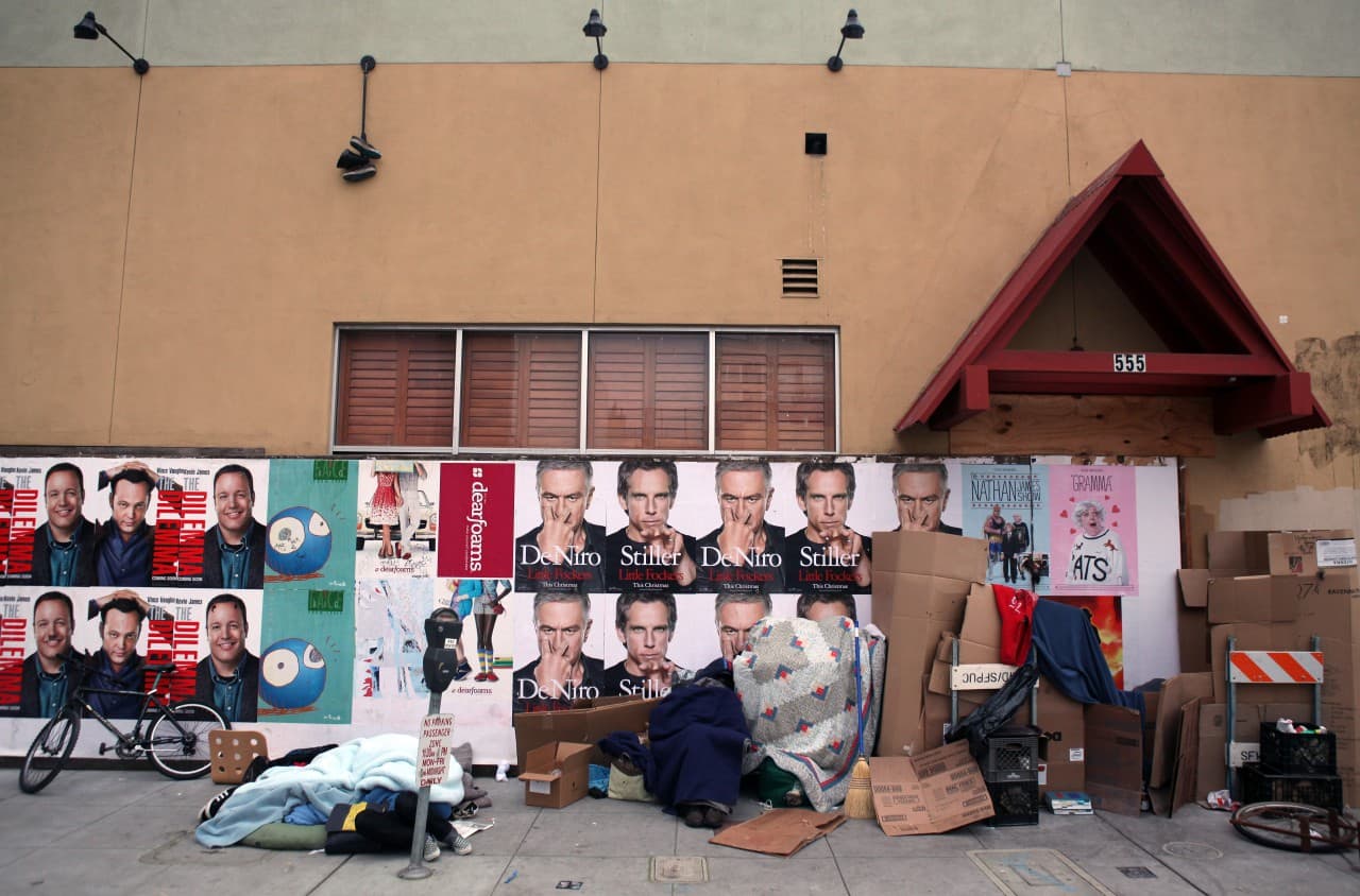 Homeless people camp in front of an out of business Trader Vic's restaurant on January 11, 2011 in San Francisco, California. (Justin Sullivan/Getty Images)